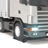 Reinforced wheel chocks in use for a large truck